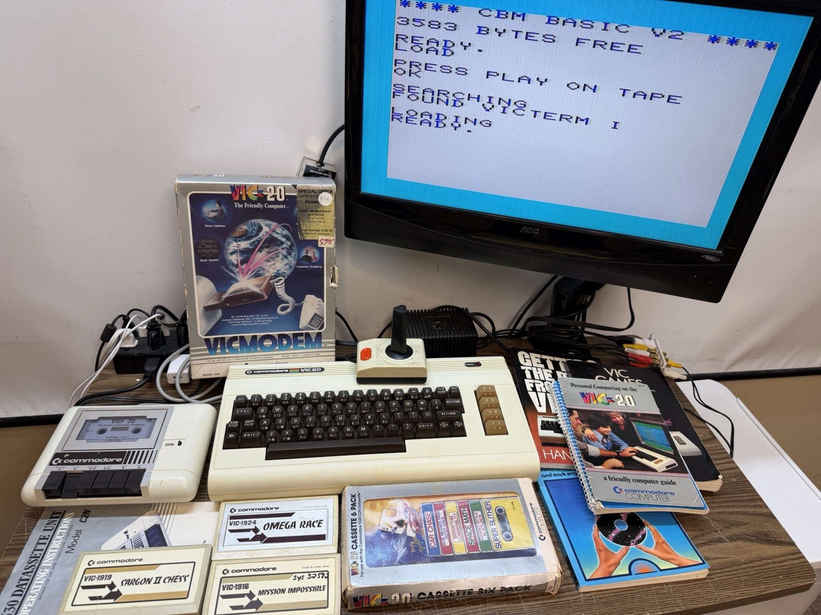 VINTAGE VIC20 LOT 1530 C2N DATASSETTE JOYSTICK VICMODEM GAMES AND MANUALS NO LCD